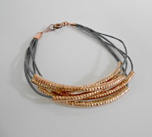 Copper, rose gold and dark blue tube bead multistrand wrap bracelet